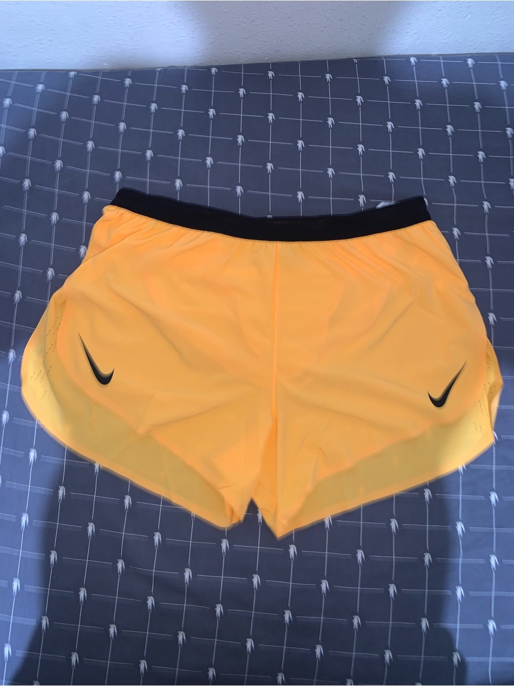 Nike Men's Yellow Athletic Shorts with Black Trim